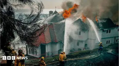 Evacuation orders as fast-moving California wildfire burns homes