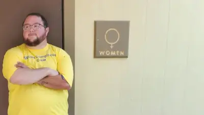 Trans men in Kansas protest state's bathroom law by following it and using women's restrooms